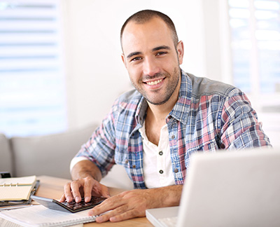 Man using a mortgage calculator