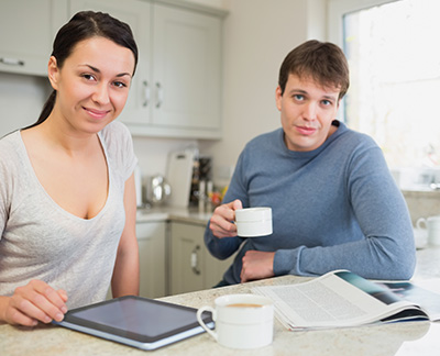 Couple reading on mortgage news