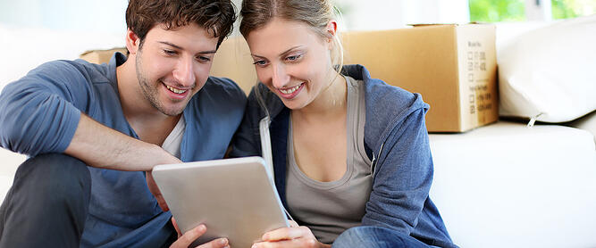 Couple looking a mortgage refinancing options in Calgary